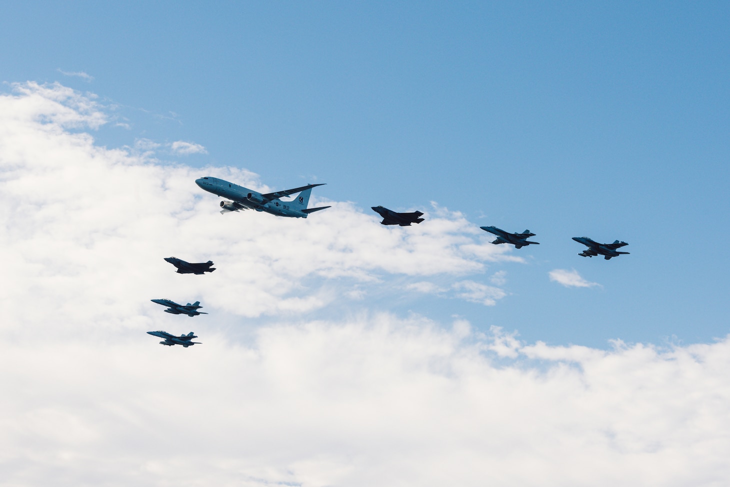 Aircraft from Carrier Air Wing (CVW) 5 and a Republic of Korea Navy P-8A Poseidon maritime patrol aircraft fly in formation while participating in Carrier Strike Group Exercise (CSGEX) while at sea, Nov. 12, 2025. CSGEX is a bilateral exercise that strengthens naval interoperability, enhances the U.S. and Republic of Korea alliance, and demonstrates joint commitment to a free and open Indo-Pacific. USS George Washington (CVN 73) is the U.S. Navy’s premier forward-deployed aircraft carrier, a long-standing symbol of the United States’ commitment to maintaining a free and open Indo-Pacific region, while operating alongside allies and partners across the U.S. Navy’s largest numbered fleet. (U.S. Navy photo by Mass Communication Specialist Geoffrey L. Ottinger)