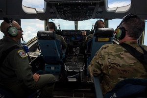 Reserve Citizen Airmen with the 732nd Airlift Squadron, 514th Air Mobility Wing, fly a C-17 Globemaster III over Key West, Fla., on June 10, 2022. The training was conducted to simulate a real world threat in which a C-17 would deliver assets in contested territory.