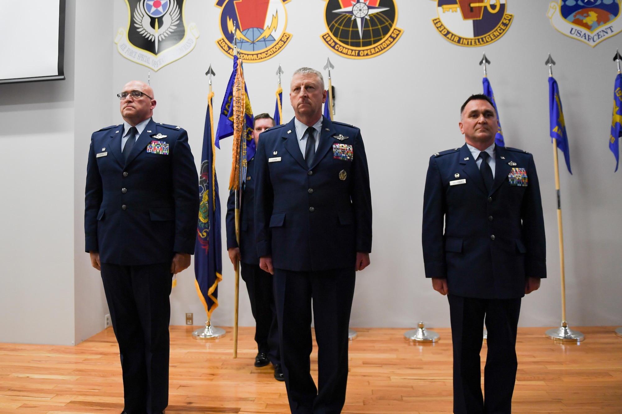 Col. Kevin Dellicker (right) assumed command of the 193rd Air Operations Group after receiving the guidon from Col. Robert Noren, commander of the 193rd Special Operations Wing, during a ceremony at the 193rd AOG in State College, Pennsylvania, on Nov. 15, 2025.