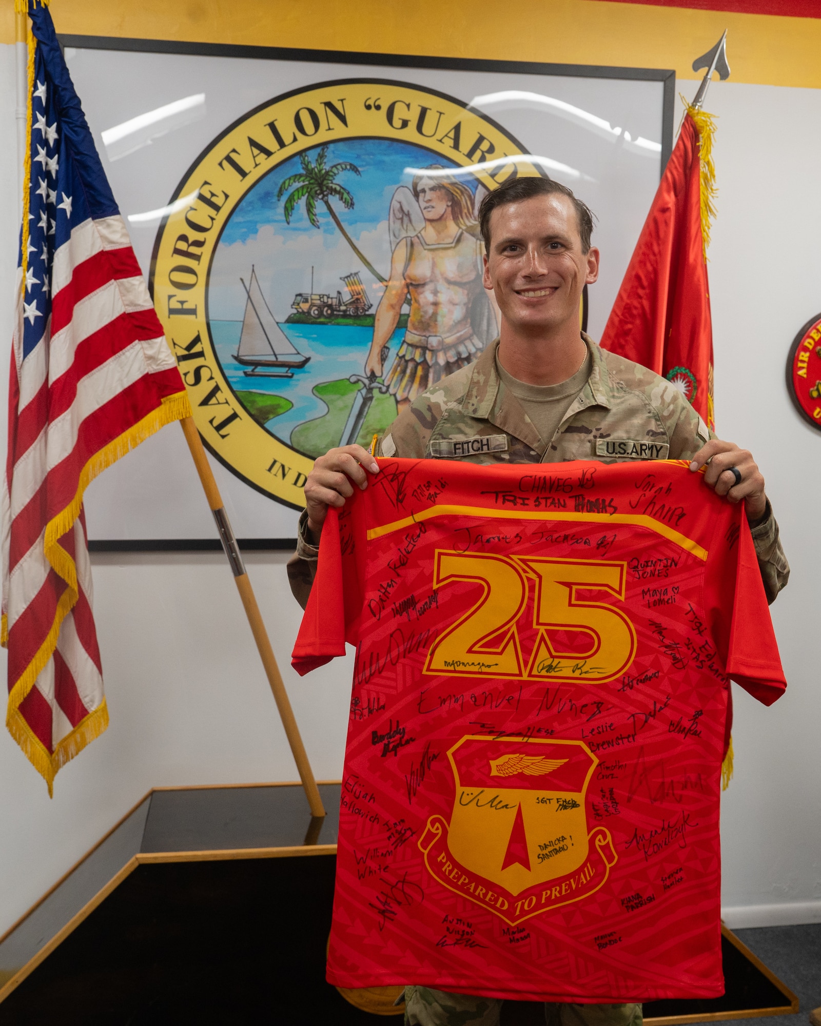 U.S. Army Sgt. Michail Fitch, Prime Production sergeant for Task Force Talon, 38th Air Defense Artillery Brigade, receives Linebacker of the Week recognition by the 36th Wing Command Team on Andersen Air Force Base, Guam, Oct. 17, 2025.