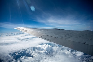 A U.S. Air Force KC-135 Stratotanker assigned to the 909th Air Refueling Squadron flies over the Pacific Ocean during a refueling mission in preparation of Exercise Bushido Guardian 2025.