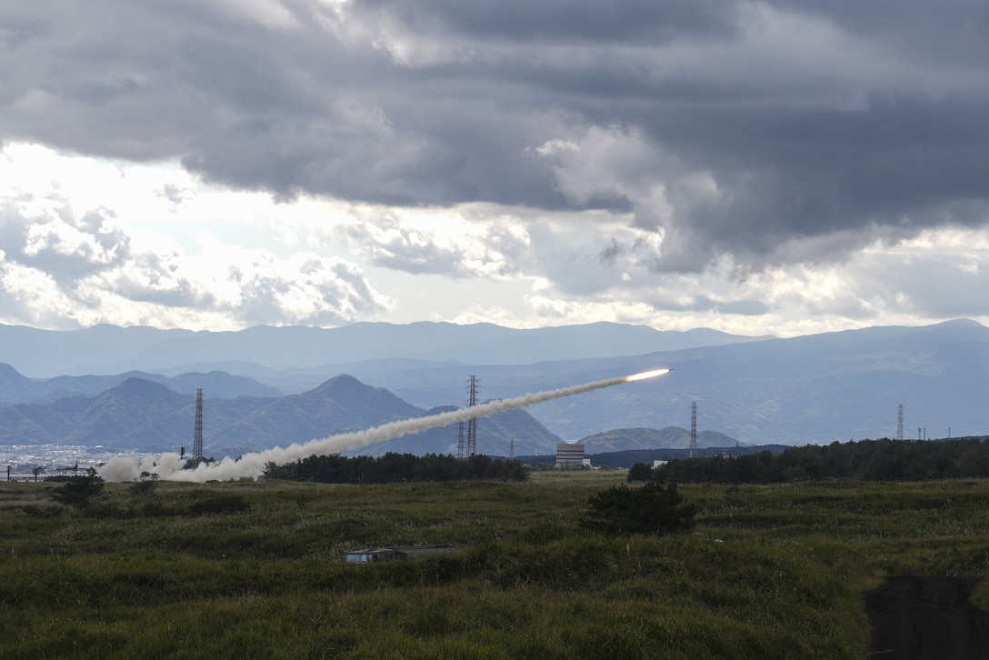 U.S. Marines with 3rd Battalion, 12th Marine Regiment, 3rd Marine Division execute a High Mobility Artillery Rocket System live-fire mission at the Combined Arms Training Center, Camp Fuji, Japan, Oct. 27, 2025. HIMARS training at Camp Fuji offers unique advantages, including realistic training terrain, adequate range capacity, and specialized infrastructure necessary to safely and effectively support HIMARS operations. This training represents a significant advancement of Camp Fuji’s capability to support long-range fires and reflects our commitment to maintaining readiness and maximizing deterrence in the Indo-Pacific. (U.S. Air Force photo by Tech. Sgt. Emerson Nuñez)