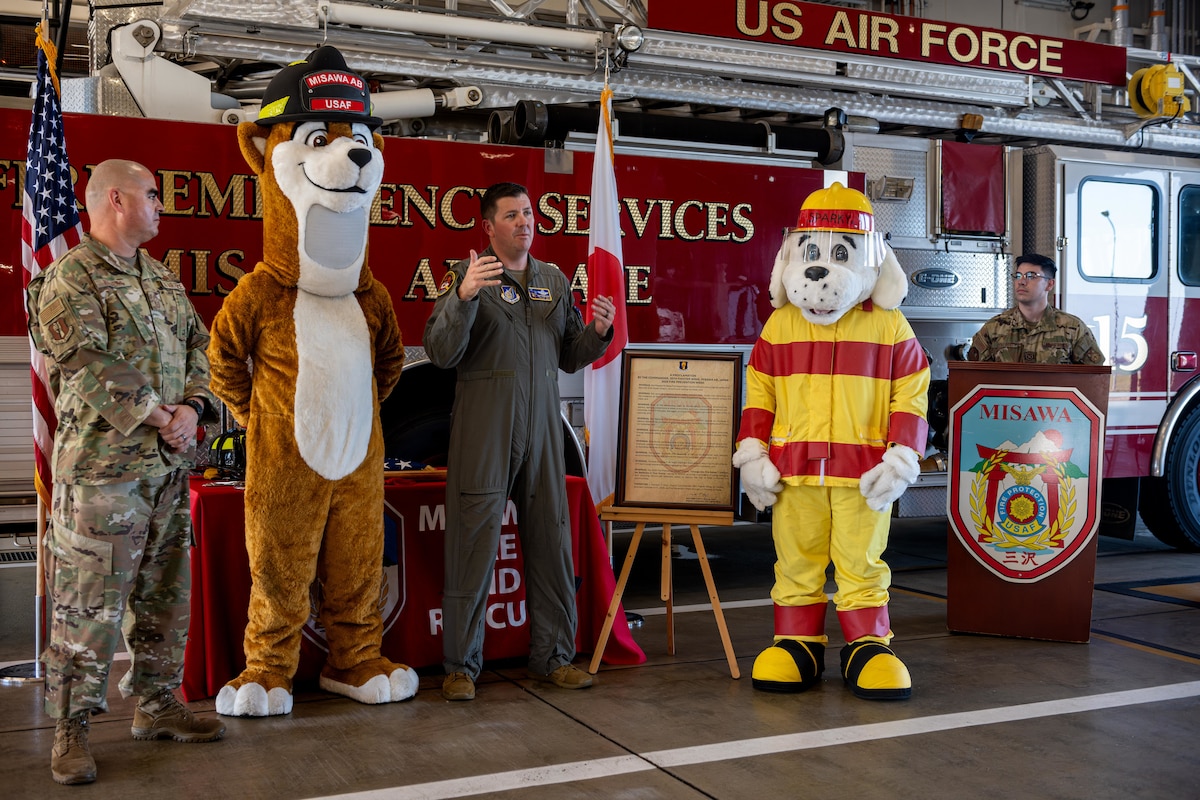 U.S. Air Force Col. Matthew Hoyt, center, 35th Fighter Wing (FW) deputy commander, thanks the 35th Civil Engineer Squadron during the Fire Prevention Week 2025 proclamation.