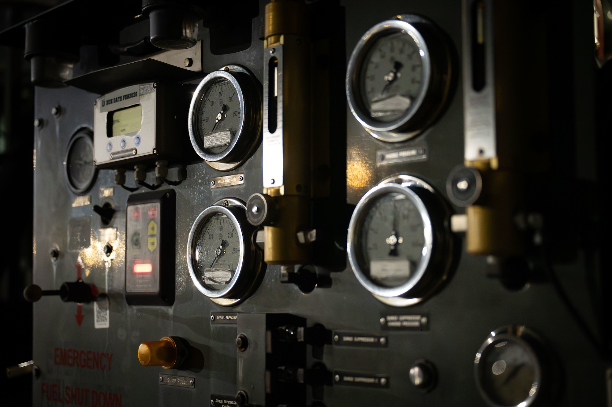 Pressure gauges on machine.