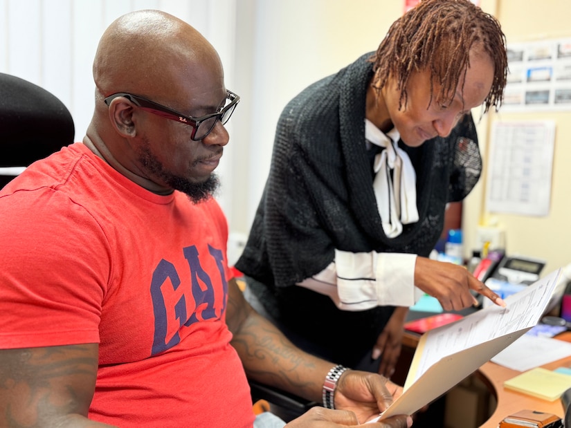 Dwohn Luckey (left) is the Centrally Billed Account operations manager and Army civilian employee with Base Support Operations Transportation, 405th Army Field Support Brigade. He is also a retired Army senior noncommissioned officer and BASOPS Transportation’s Army civilian employee of the quarter.