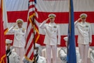 MANAMA, Bahrain (Oct. 5, 2025) U.S. Navy Adm. Brad Cooper, commander of U.S. Central Command, left; Vice Adm. George Wikoff, outgoing commander of U.S. Naval Forces Central Command (NAVCENT), U.S. 5th Fleet and Combined Maritime Forces (CMF), center; and Vice Adm. Kurt Renshaw, incoming commander of NAVCENT, U.S. 5th Fleet and CMF, right; render honors during a change of command ceremony in Manama, Bahrain (U.S. Navy photo by Mass Communication Specialist 2nd Class Iain Page)