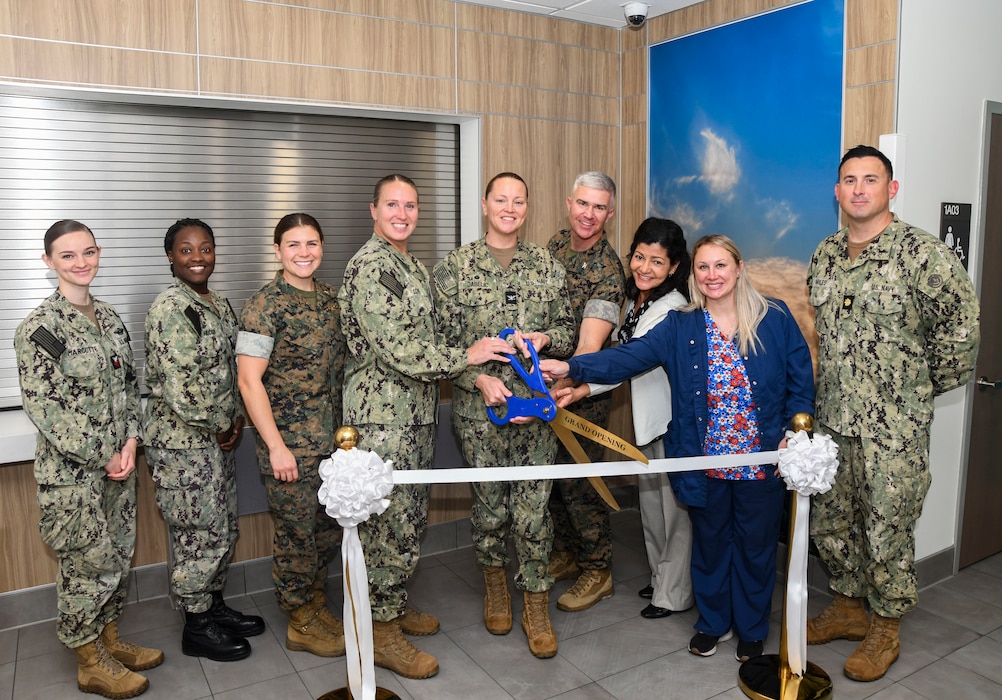 251022-N-FB730-1007 CAMP LEJEUNE. (October 22, 2025) Leadership and clinic staff pose for a photo during the ribbon cutting ceremony for the new branch medical clinic aboard Camp Johnson, on October 22, 2025. Camp Johnson Branch Medical Clinic is an active-duty clinic that provides care for all military members aboard Camp Johnson base including permanent personnel and students. (U.S. Navy photo by Mass Communications Specialist second class Justin Woods)