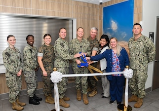 251022-N-FB730-1007 CAMP LEJEUNE. (October 22, 2025) Leadership and clinic staff pose for a photo during the ribbon cutting ceremony for the new branch medical clinic aboard Camp Johnson, on October 22, 2025. Camp Johnson Branch Medical Clinic is an active-duty clinic that provides care for all military members aboard Camp Johnson base including permanent personnel and students. (U.S. Navy photo by Mass Communications Specialist second class Justin Woods)