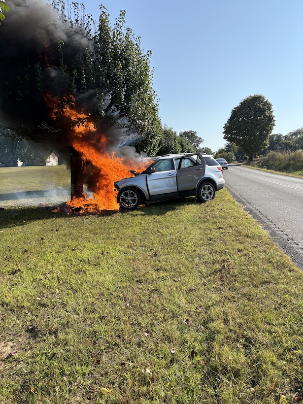 A vehicle burns in Coffee County, Tennessee, Sept. 20, 2025, after Special Agent Zach Angelo, chief of AFOSI Office of Special Projects OLE-3.