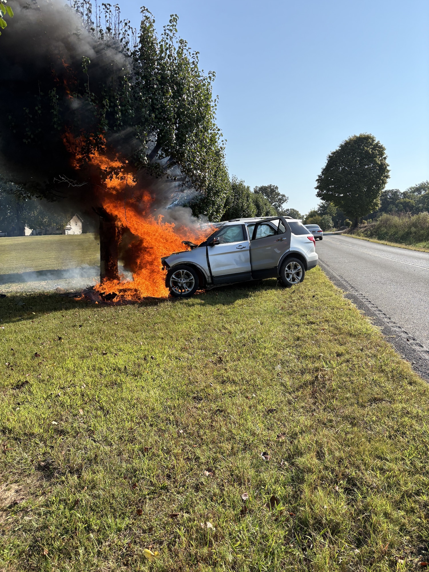 A vehicle burns in Coffee County, Tennessee, Sept. 20, 2025, after Special Agent Zach Angelo, chief of AFOSI Office of Special Projects OLE-3.