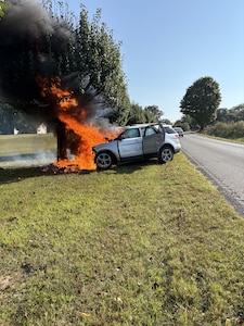 A vehicle burns in Coffee County, Tennessee, Sept. 20, 2025, after Special Agent Zach Angelo, chief of AFOSI Office of Special Projects OLE-3.