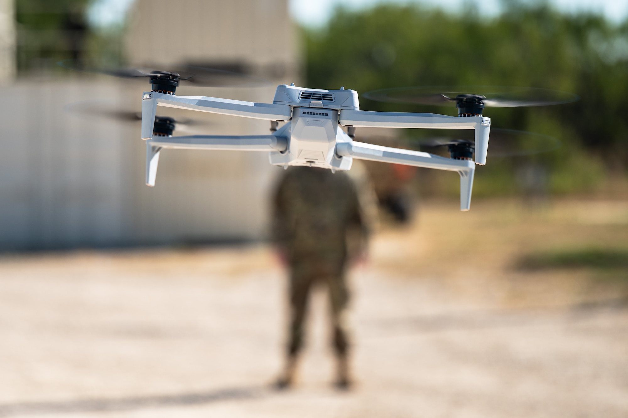 A Skydio X10, operated by the 7th Security Forces Squadron, is used for surveillance around Ray Rangel  Air Base during exercise Coyote Shield at Dyess Air Force Base, Texas, Oct. 17, 2025.  Coyote Shield highlighted the Department of the Air Force's commitment to security by integrating counter-Small Unmanned Aircraft Systems capabilities with traditional defense, communications, and asset safeguarding, showcasing a layered defense approach to protecting installations and personnel. (U.S. Air Force photo by Senior Airman Jade M. Caldwell)
