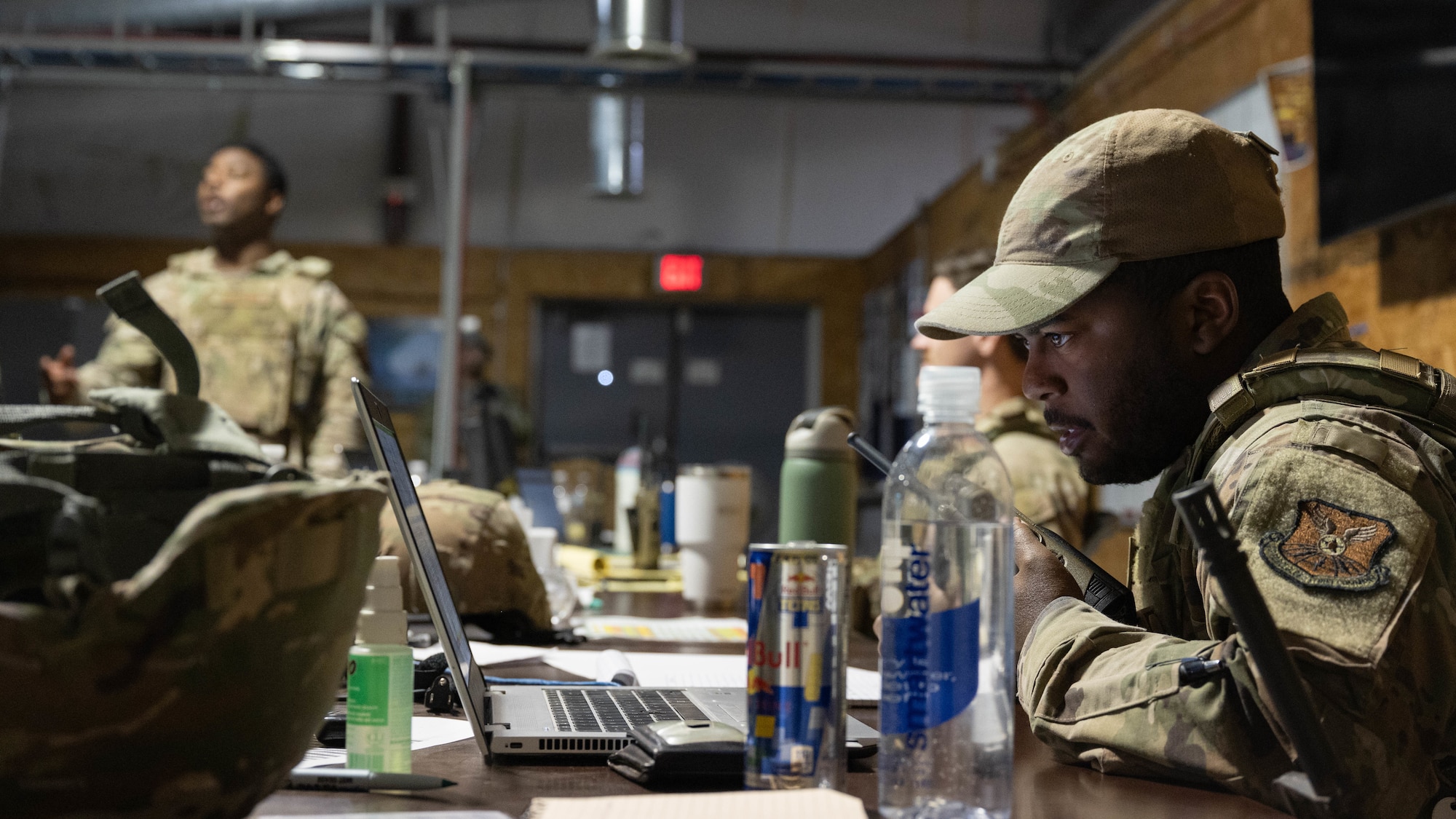 U.S. Air Force Senior Airman Demetrius Turner, 7th Civil Engineer Squadron material control specialist, monitors operations during exercise Coyote Shield at Dyess Air Force Base, Texas, Oct. 17, 2025. Coyote Shield was designed to exceed a 96-hour readiness training event requirement. (U.S. Air Force photo by Airman William Neal)