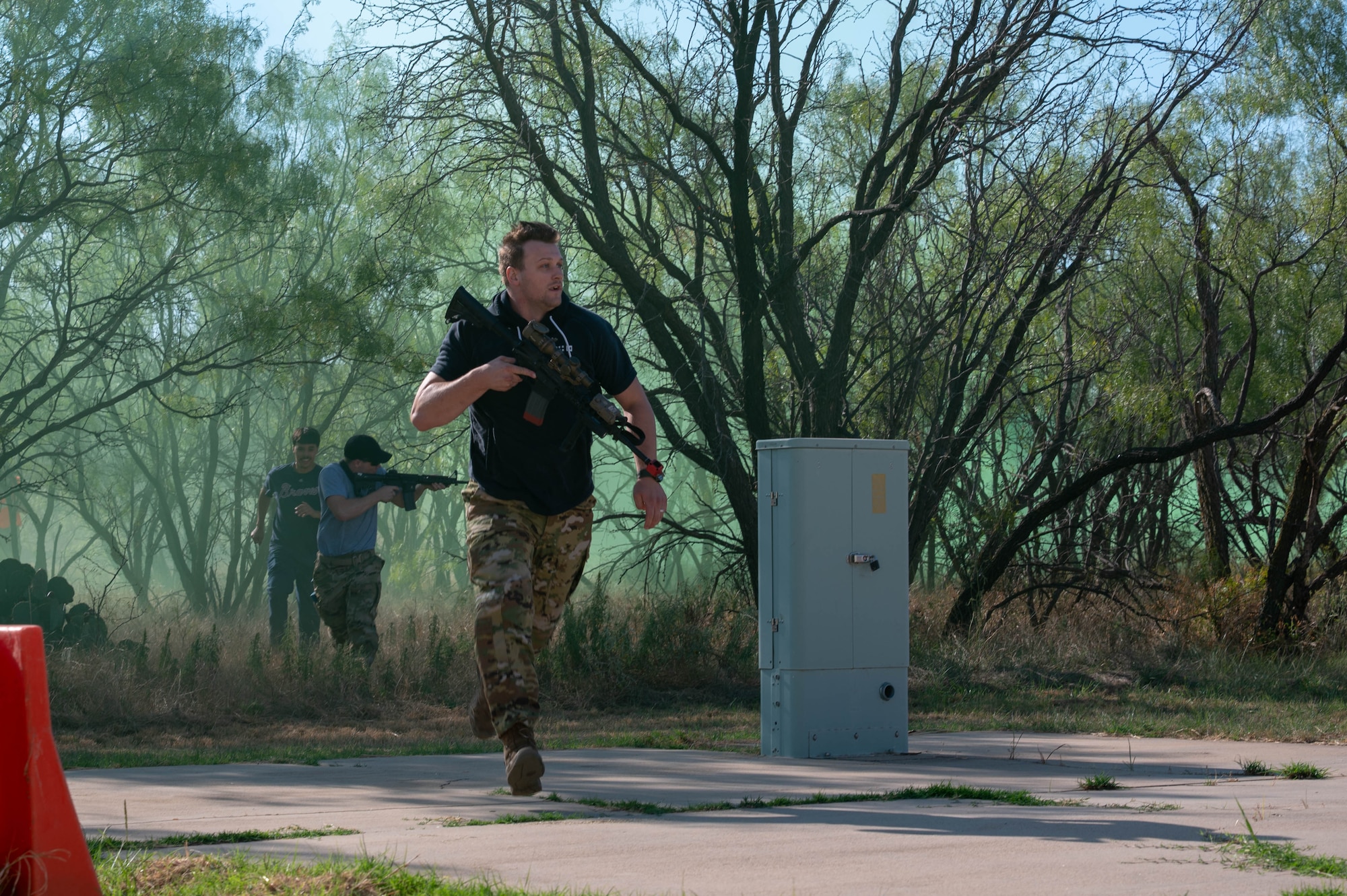 U.S Air Force Senior Airman Easton Neese, 7th Security Forces Squadron member, acts as an opposing force during exercise Coyote Shield at Dyess Air Force Base, Texas, Oct. 17, 2025. Coyote Shield enabled 7th CES and 7th SFS Airmen to enhance expertise in base recovery, support reception, and command and control re-establishment, bolstering the 7th Bomb Wing's operational effectiveness in contested environments. (U.S. Air Force photo by Airman William Neal)