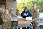 The Keller Army Community Hospital Command team poses with the Regional Food Bank of New York volunteer as Keller donates frozen repurpose prepared and wholesome foods that will reach individuals and families in need. 

Pictured (from l-r) is Capt. Jacquelyn Contant, Chief, Nutrition Care Division; Maj. Andrew Neubecker, Deputy Commander for Administration; Command Sgt. Maj. Julie C. Morris, Command Sergeant Major; Joe Zinko, RFBoNY volunteer; and Col. Sean J. Hipp, Commander.