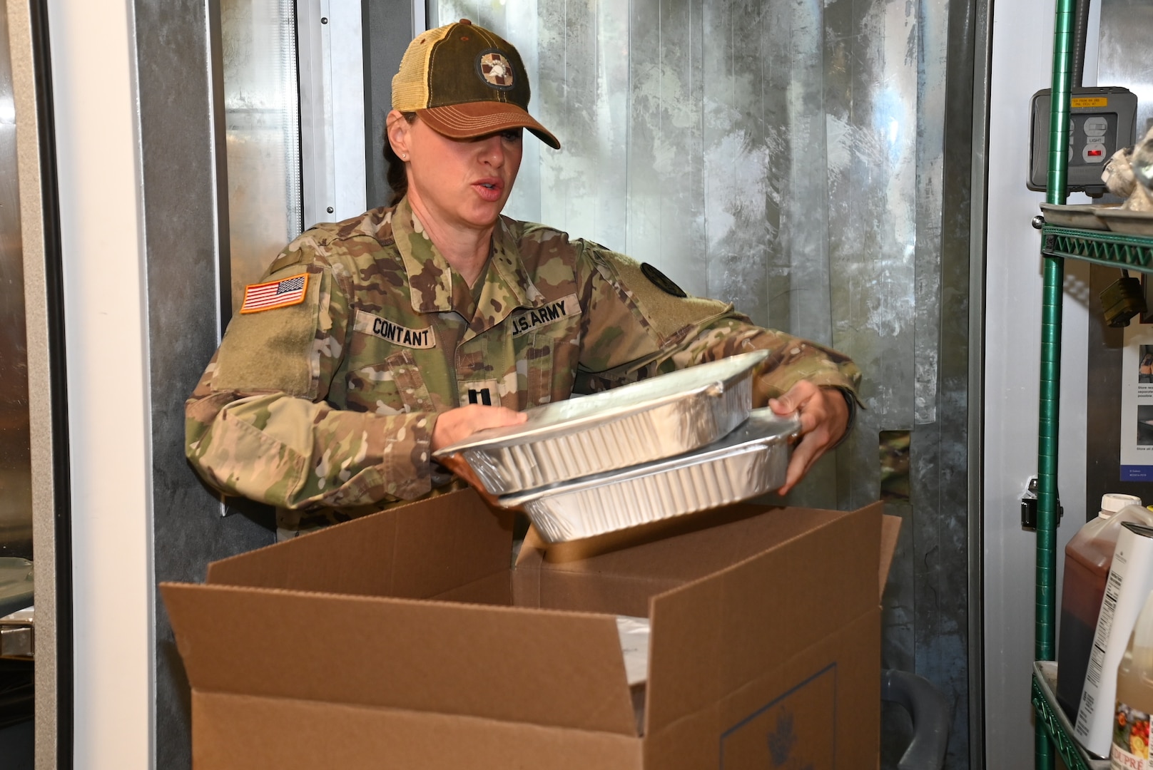 Capt. Jacquelyn Contant, Chief, Nutrition Care Division, Keller Army Community Hospital, boxes frozen repurpose prepared and wholesome foods for donation to the Regional Food Bank of New York. Through the partnership with RFBoNY, this donated food will reach individuals and families in need rather than ending up in landfills.
