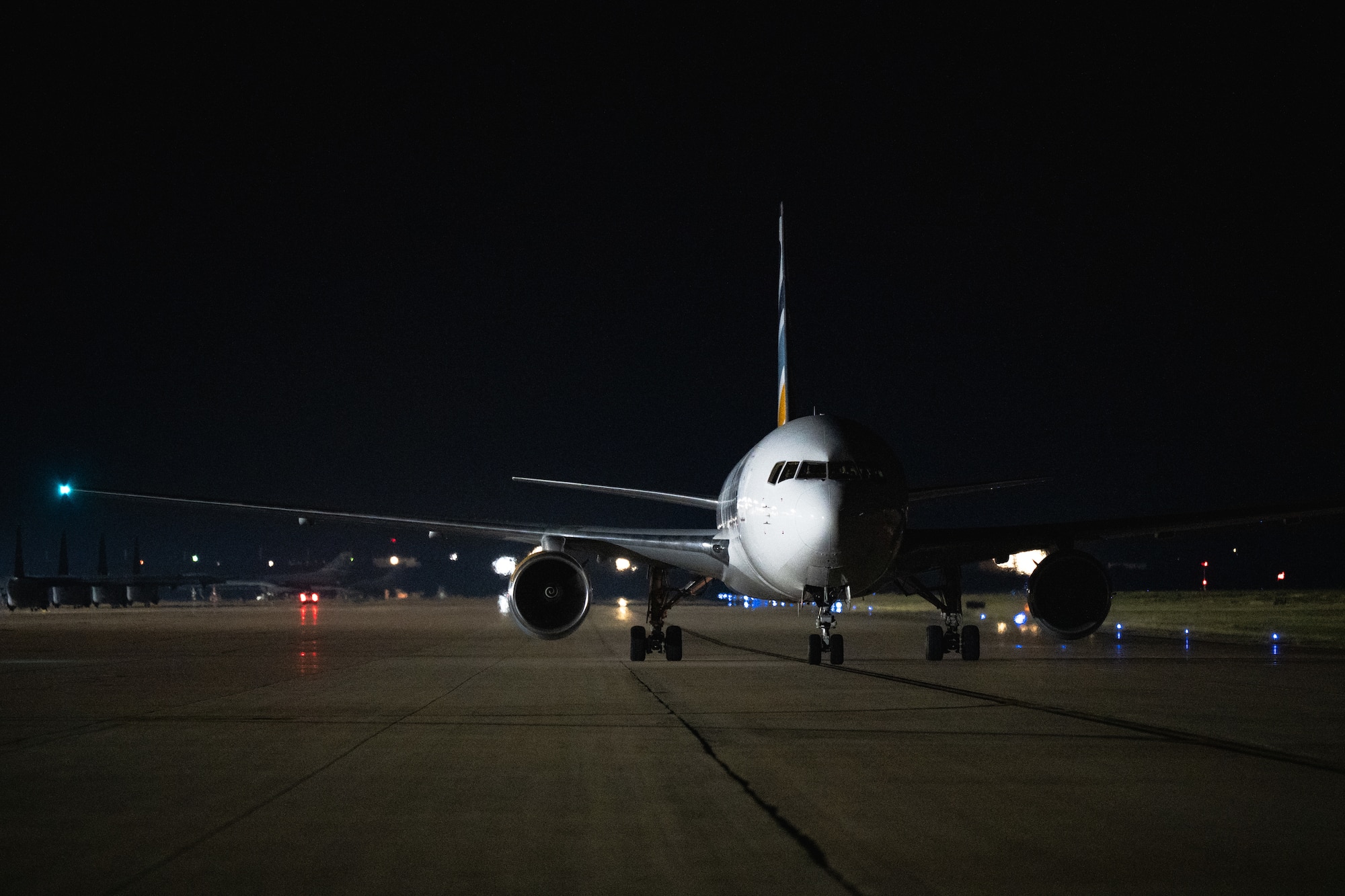 An Eastern Airlines Boeing 767-300 transporting U.S. Airmen from Barksdale Air Force Base, Louisiana, and Minot AFB, North Dakota, taxis off the runway as part of Exercise Global Thunder 26 at Dyess AFB, Texas, Oct. 25, 2025. Global Thunder is an annual command and control exercise designed to train U.S. Strategic Command Forces and assess joint operational readiness. (U.S. Air Force photo by Senior Airman Jade M. Caldwell)