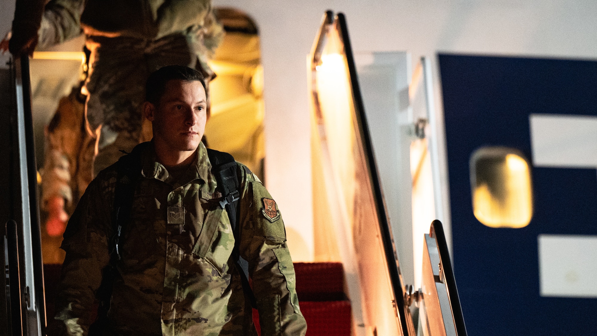 U.S. Airmen stationed at Minot Air Force Base, North Dakota, and Barksdale AFB, Louisiana, exit an Eastern Airlines Boeing 767-300 as part of Exercise Global Thunder 26 at Dyess AFB, Texas, Oct. 25, 2025. Global Thunder is an annual command and control exercise designed to train U.S. Strategic Command Forces and assess joint operational readiness. (U.S. Air Force photo by Senior Airman Jade M. Caldwell)