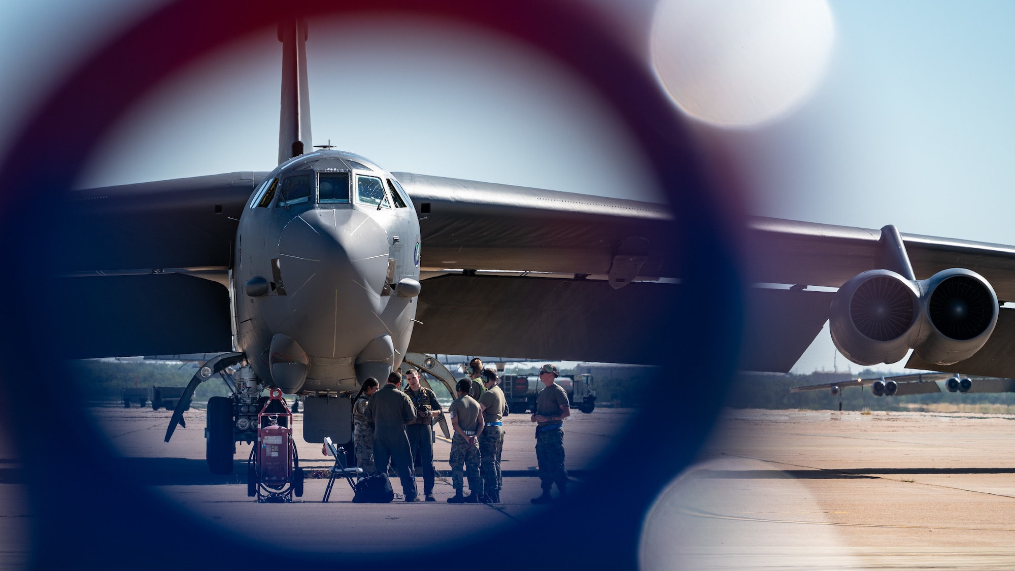 U.S. Airmen stationed at Minot Air Force Base, North Dakota, and Barksdale AFB, Louisiana, discuss operations, as part of Exercise Global Thunder 26 at Dyess AFB, Texas, Oct. 26, 2025. Global Thunder is an annual command and control exercise designed to train U.S. Strategic Command Forces and assess joint operational readiness. (U.S. Air Force photo by Senior Airman Jade M. Caldwell)