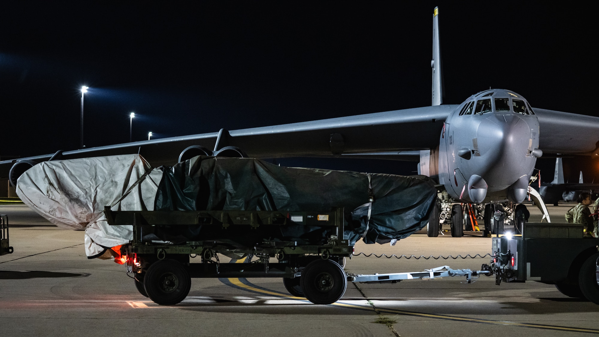 A U.S. Air Force B-52 Stratofortress, stationed at Minot Air Force Base, North Dakota, is parked behind a training munition as part of Exercise Global Thunder 26 at Dyess AFB, Texas, Oct. 28, 2025. Global Thunder is an annual command and control exercise designed to train U.S. Strategic Command Forces and assess joint operational readiness. (U.S. Air Force photo by Senior Airman Jade M. Caldwell)