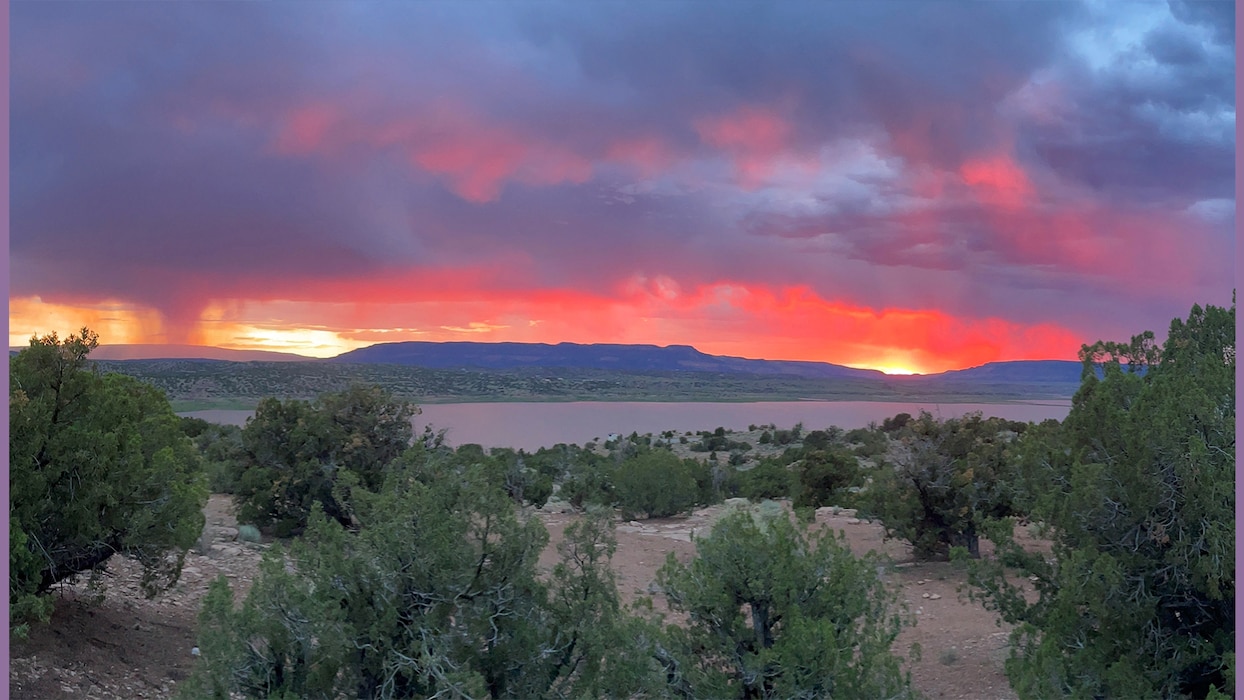 Smoke from the Indios Fire and a passing rainstorm make for the most amazing sunset colors, July 11, 2024, - no filter needed. The photo was taken at the volunteer site in the Riana Campground at Abiquiu Lake, N.M., by Pamela Bowie.