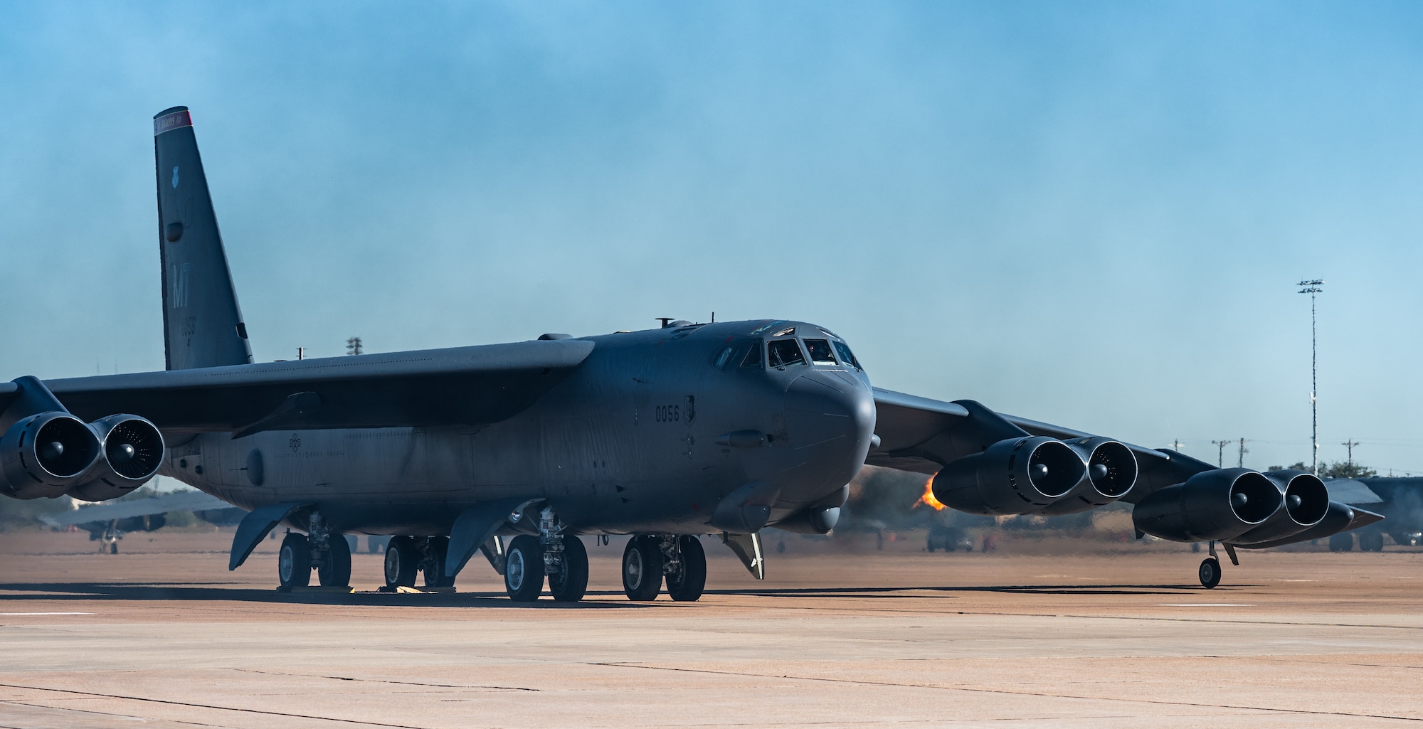 A U.S. Air Force B-52 Stratofortress, stationed at Minot Air Force Base, North Dakota, starts engines in preparation for departure as part of Exercise Global Thunder 26 at Dyess AFB, Texas, Oct. 29, 2025. Global Thunder is an annual command and control exercise designed to train U.S. Strategic Command Forces and assess joint operational readiness. (U.S. Air Force photo by Senior Airman Jade M. Caldwell)