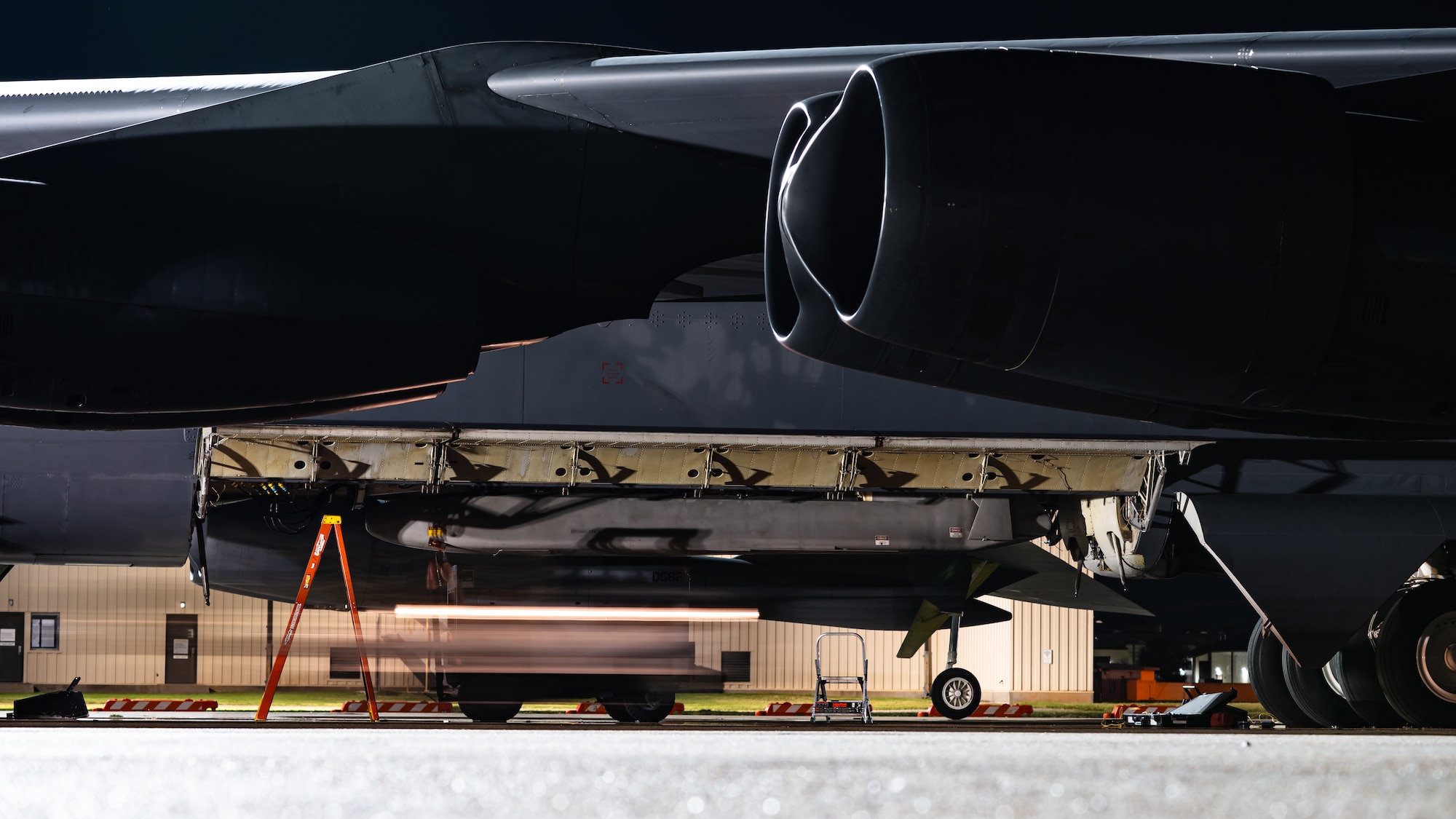 U.S. Airmen load a training munition onto a U.S. Air Force B-52 Stratofortress, stationed at Minot Air Force Base, North Dakota, as part of Exercise Global Thunder 26 at Dyess AFB, Texas, Oct. 28, 2025. Global Thunder is an annual command and control exercise designed to train U.S. Strategic Command Forces and assess joint operational readiness. (U.S. Air Force photo by Senior Airman Jade M. Caldwell)