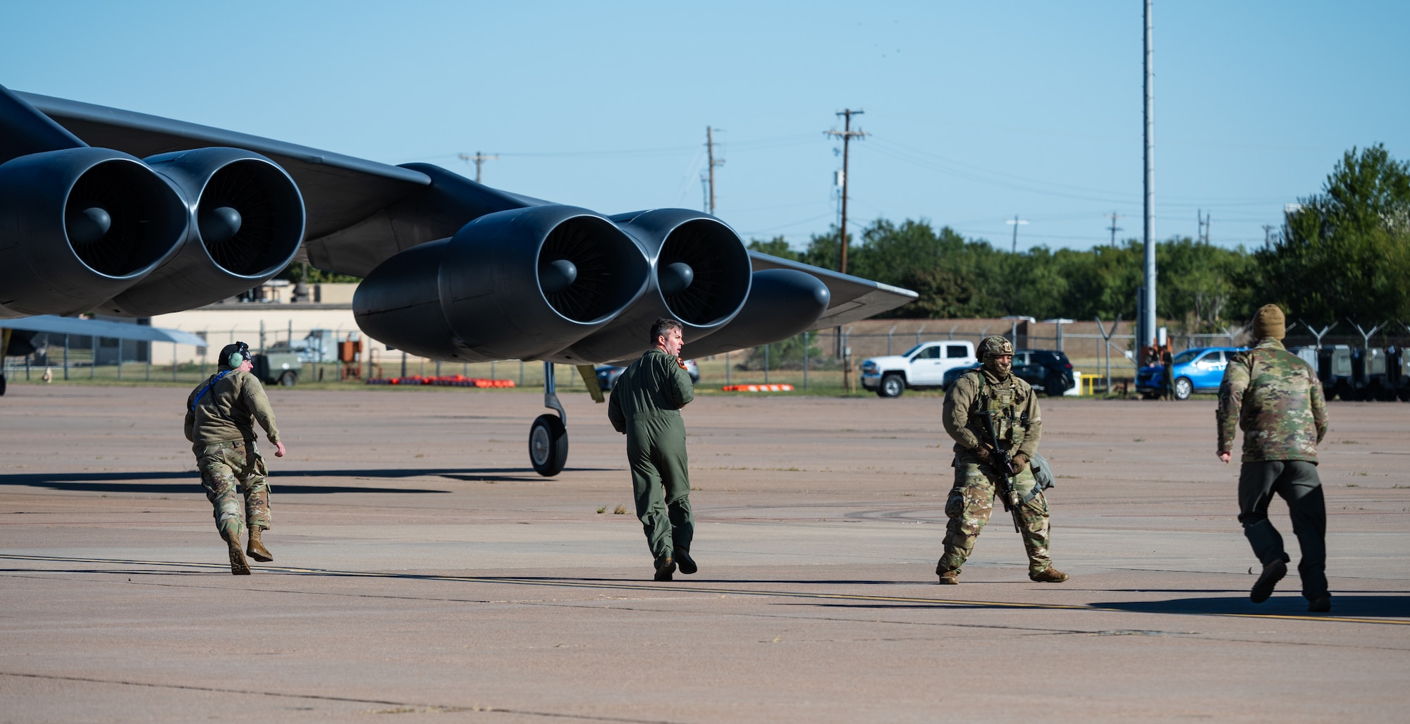 U.S. Airmen stationed at Barksdale Air Force Base, Louisiana, and Minot AFB, North Dakota, respond to an alert for departure as part of Exercise Global Thunder 26 at Dyess AFB, Texas, Oct. 29, 2025. Global Thunder is an annual command and control exercise designed to train U.S. Strategic Command Forces and assess joint operational readiness. (U.S. Air Force photo by Senior Airman Jade M. Caldwell)