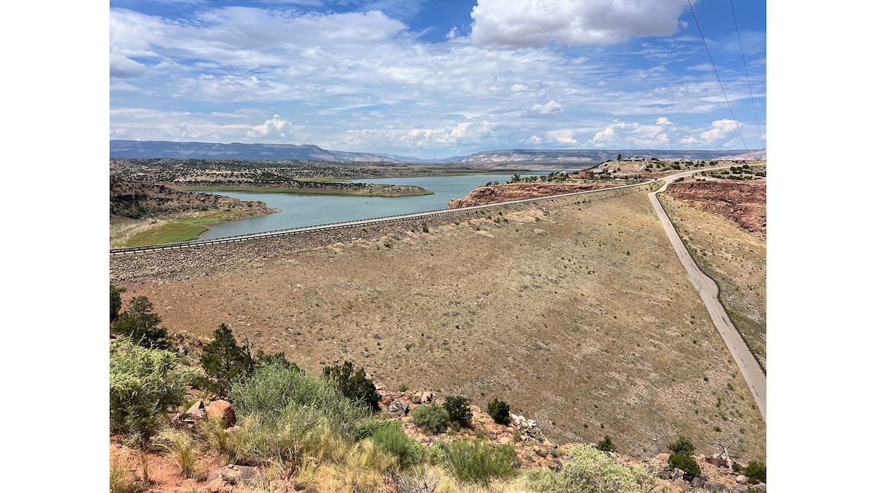 An overview of Abiquiu Dam and Reservoir as seen from the right abutment staging area, July 23, 2025. Photo by Chris Carroll.