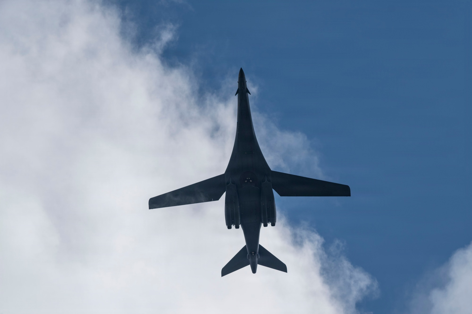 A U.S. Air Force B-1B Lancer assigned to the 9th Expeditionary Bomb Squadron flies above Misawa Air Base, Japan, Oct. 17, 2025, for a bomber task force deployment. BTF deployments showcase national ability to respond to any contingency and maintain operational capabilities to meet security obligations in the Indo-Pacific. (U.S. Air Force photo by Senior Airman Emma Anderson)