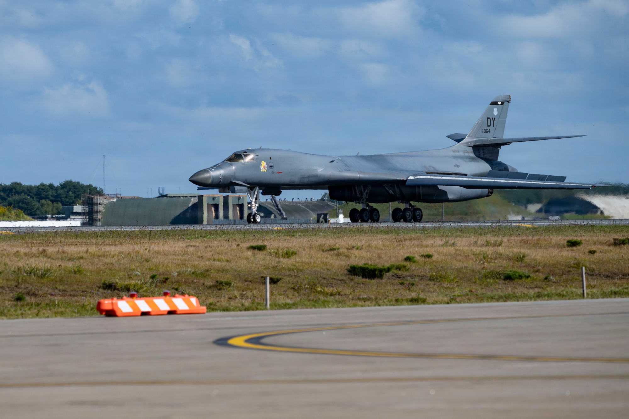 A plane lands on the runway