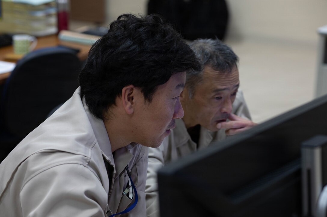 Japanese master labor contractors with branch utilities, Marine Corps Air Station Iwakuni, monitor the power grid for a deliberate black out simulating a cyber-attack on the electrical grid during Active Shield 26 at MCAS Iwakuni, Japan, Oct. 21, 2025. Active Shield is an annual bilateral exercise hosted by MCAS Iwakuni that strengthens interoperability between U.S. and Japanese forces and enhances the defense capability of USINDOPACOM. (U.S. Marine Corps photo by Lance Cpl. Tyler Bassett)