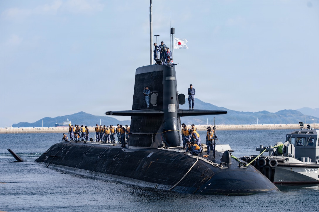 The Japan Maritime Self-Defense Force JS Unryu (SS-502), with Submarine Division 5, Fleet Submarine Force, arrives for a supply operation at Marine Corps Air Station Iwakuni, Japan, Oct. 27, 2025. The JMSDF JS Unryu (SS-502) submarine visited MCAS Iwakuni’s harbor to practice resupply operations and demonstrate logistical capabilities. (U.S. Marine Corps photo by Lance Cpl. Donald Dugger)