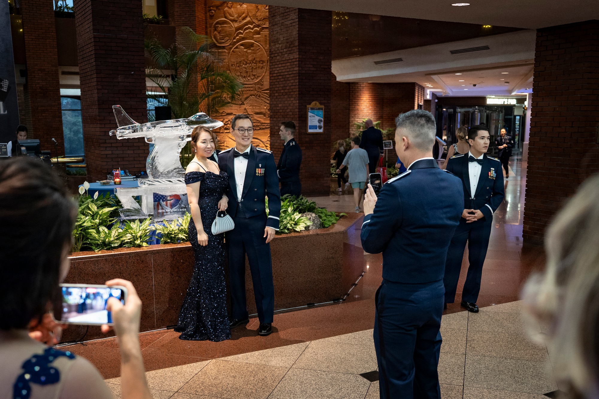 Attendees take commemorative photos at the 2025 Air Force Ball in Seoul, Republic of Korea, Oct. 10, 2025.