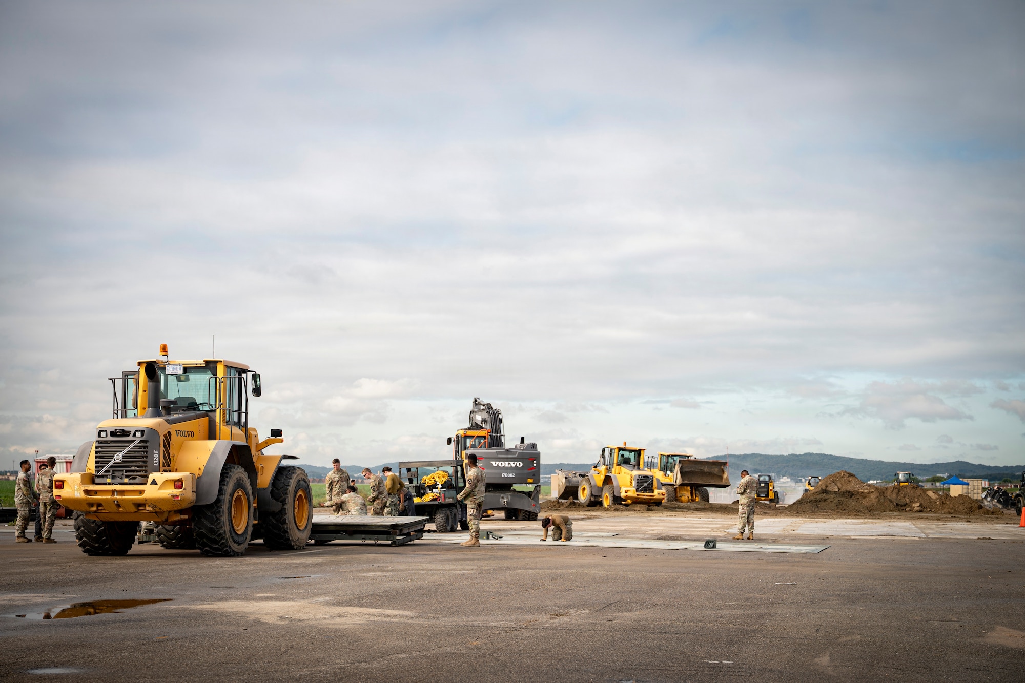 Members of the U.S. Air Force, Army and Navy conduct a joint rapid airfield damage repair training at Osan Air Base, Republic of Korea, Oct.16, 2025.
