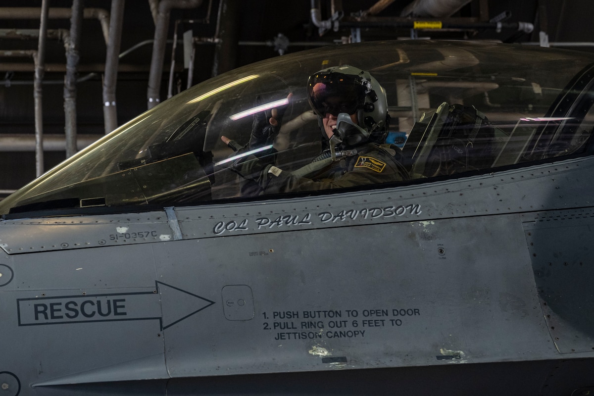 A U.S. Air Force F-16 Fighting Falcon pilot assigned to the 35th Fighter Wing stops his aircraft during a hot pit refuel during Beverly Sunrise 26-01 at Misawa Air Base, Japan, Oct. 16, 2025. Hot pit refueling operations enable F-16 Fighting Falcons to rapidly refuel with engines running, sustaining high sortie generation and combat readiness across the Indo-Pacific. (U.S. Air Force photo by Senior Airman Patrick Boyle)