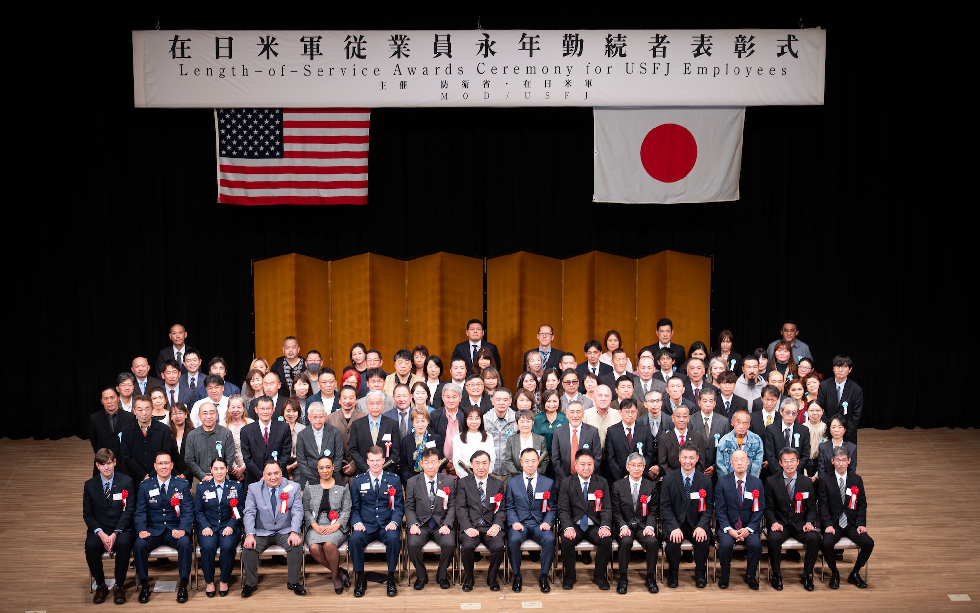 Group photo of employees being celebrated.