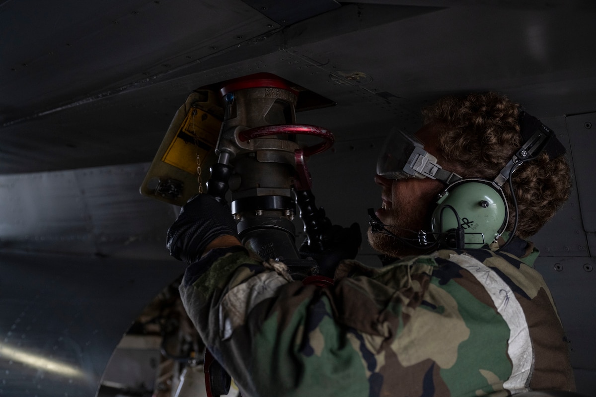U.S. Air Force Senior Airman Joshua McMillan, 14th Fighter Generation Squadron crew chief, conducts a hot pit refuel during Beverly Sunrise 26-01 at Misawa Air Base, Japan, Oct. 16, 2025. Conducting hot pit refuels enhances maintenance and fuel team proficiency, directly supporting the wing’s ability to execute high-tempo missions when response time matters most. (U.S. Air Force photo by Senior Airman Patrick Boyle)