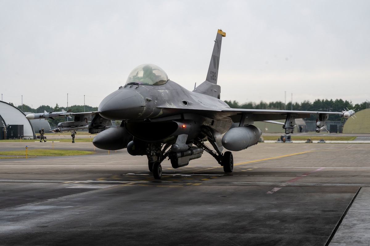 A U.S. Air Force F-16 Fighting Falcon assigned to the 35th Fighter Wing pulls up to a hot pit refuel during Beverly Sunrise 26-01 at Misawa Air Base, Japan, Oct. 16, 2025. The operation demonstrates the precision and teamwork required to sustain mission momentum, advancing the 35th Fighter Wing’s readiness to meet evolving regional challenges. (U.S. Air Force photo by Senior Airman Patrick Boyle)