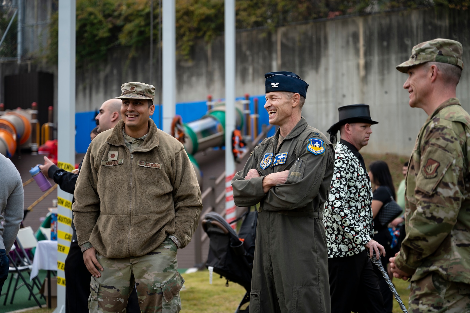 U.S. Air Force Col. Ryan Ley, 51st Fighter Wing commander, interacts with base families at the grand opening of Dinosaur Park at Osan Air Base, Republic of Korea, Oct. 31, 2025.