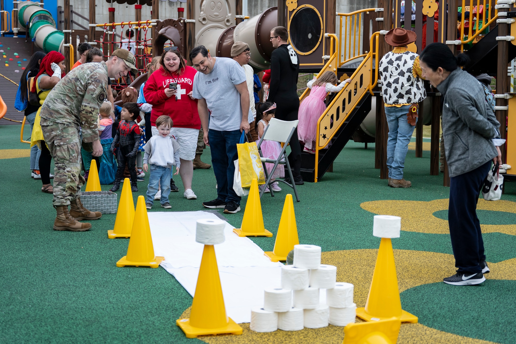 Families enjoy games during the grand opening for Dinosaur Park at Osan Air Base, Republic of Korea, Oct. 31, 2025.