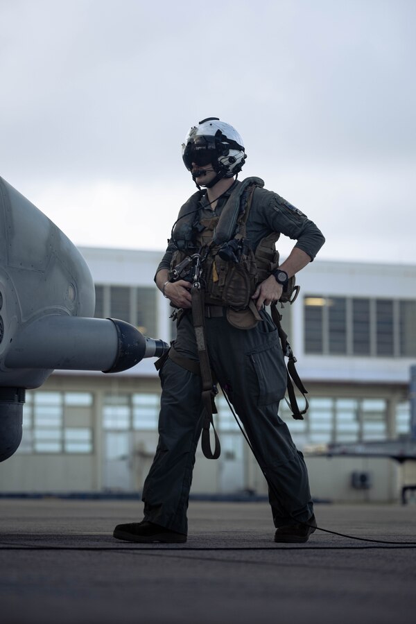 A U.S. Marine with Marine Medium Tiltrotor Squadron (VMM) 265 (Rein.), 31st Marine Expeditionary Unit, conducts preflight inspections of a U.S. Marine Corps MV-22B Osprey assigned to VMM-265 (Rein.), 31st MEU, during flight operations at Marine Corps Air Station Futenma, Okinawa, Japan, Sept. 26, 2025. The Marines conducted flight operations demonstrating multi-domain transport capabilities to support combined-joint all domain operations. The 31st MEU, the Marine Corps’ only continuously forward-deployed MEU, provides a flexible and lethal force, ready to perform a wide range of military operations as the premiere crisis response force in the Indo-Pacific region. (U.S. Marine Corps photo by Sgt. Angel Diaz Montes De Oca)