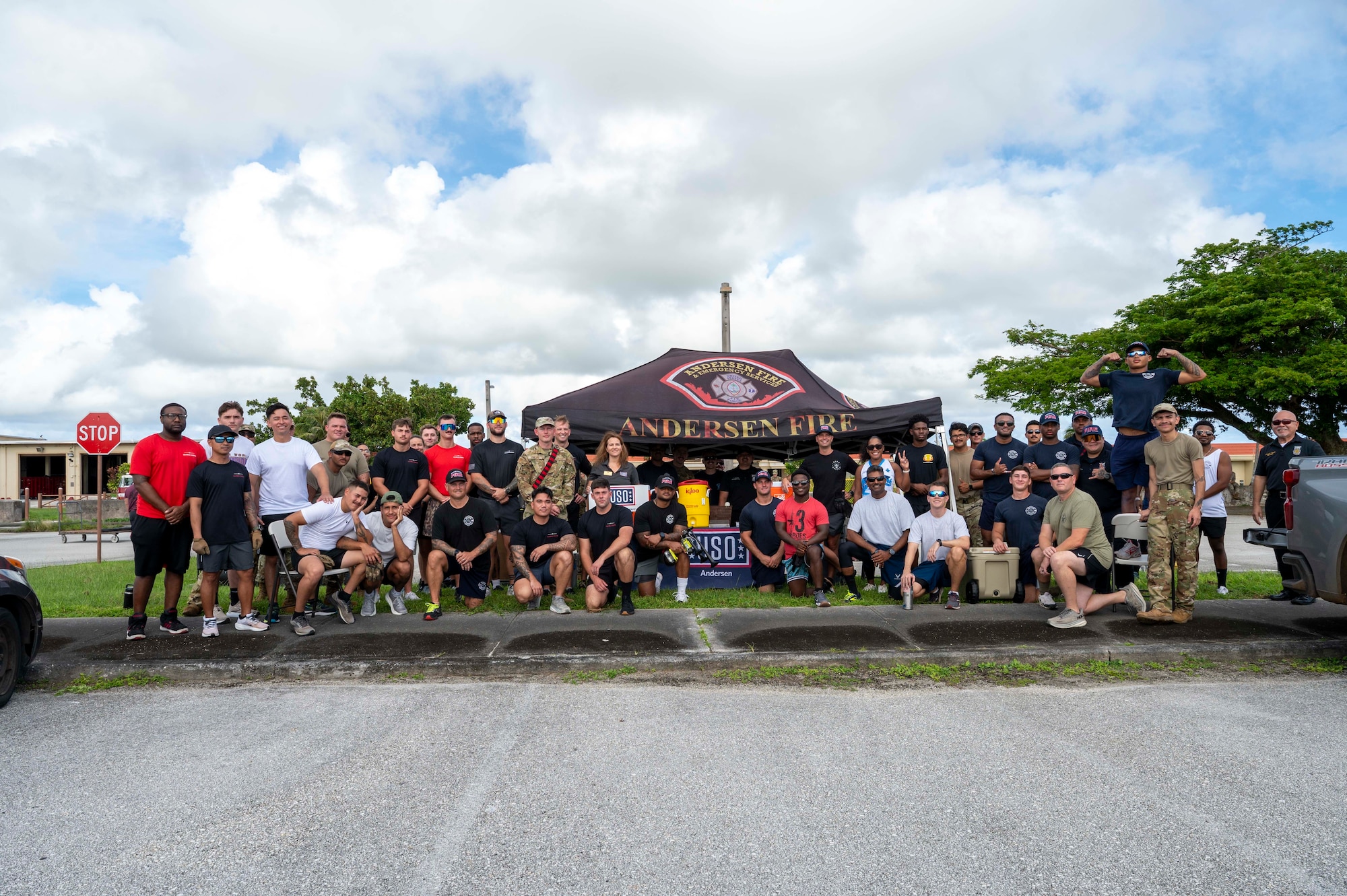 Participants of the 2025 Fire Prevention Week muster gather for a photo before completing an obstacle course at Andersen Air Force Base, Guam, Oct. 9, 2025.