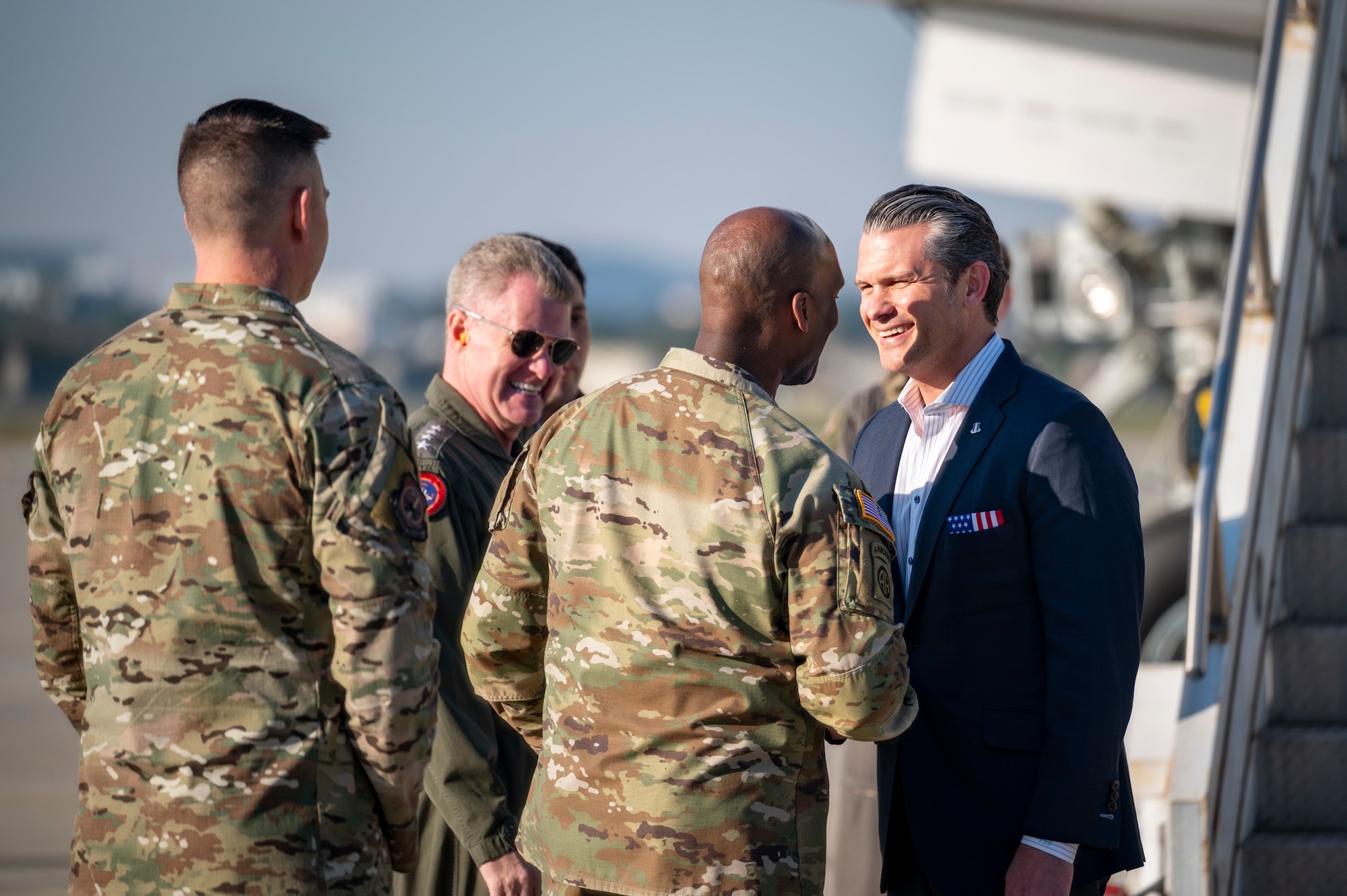 Secretary of War Pete Hegseth is welcomed by U.S. Army Gen. Xavier Brunson, commanding general of United Nations Command, Combined Forces Command, and United States Forces Korea, at Osan Air Base, Republic of Korea, Nov. 3, 2025.