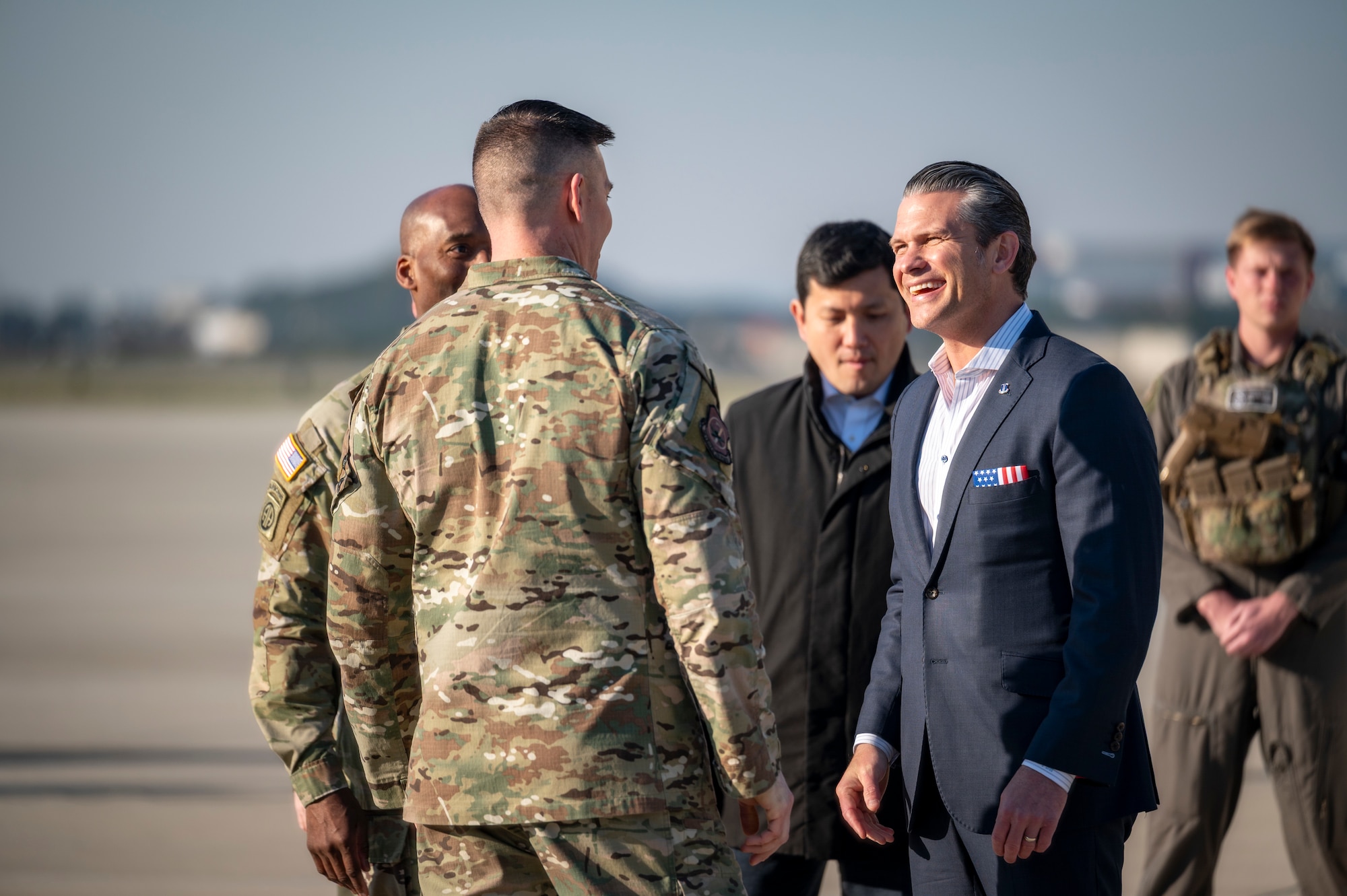 Secretary of War Pete Hegseth is welcomed by U.S. Air Force Brig. Gen. Kurt Helphinstine, Seventh Air Force deputy commander, at Osan Air Base, Republic of Korea, Nov. 3, 2025.