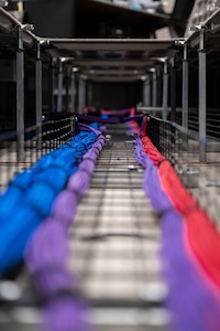 Fiber-optic cables run under a floor of the 36th Wing Installation Control Center at Andersen Air Force Base, Guam, Sept. 17, 2025.