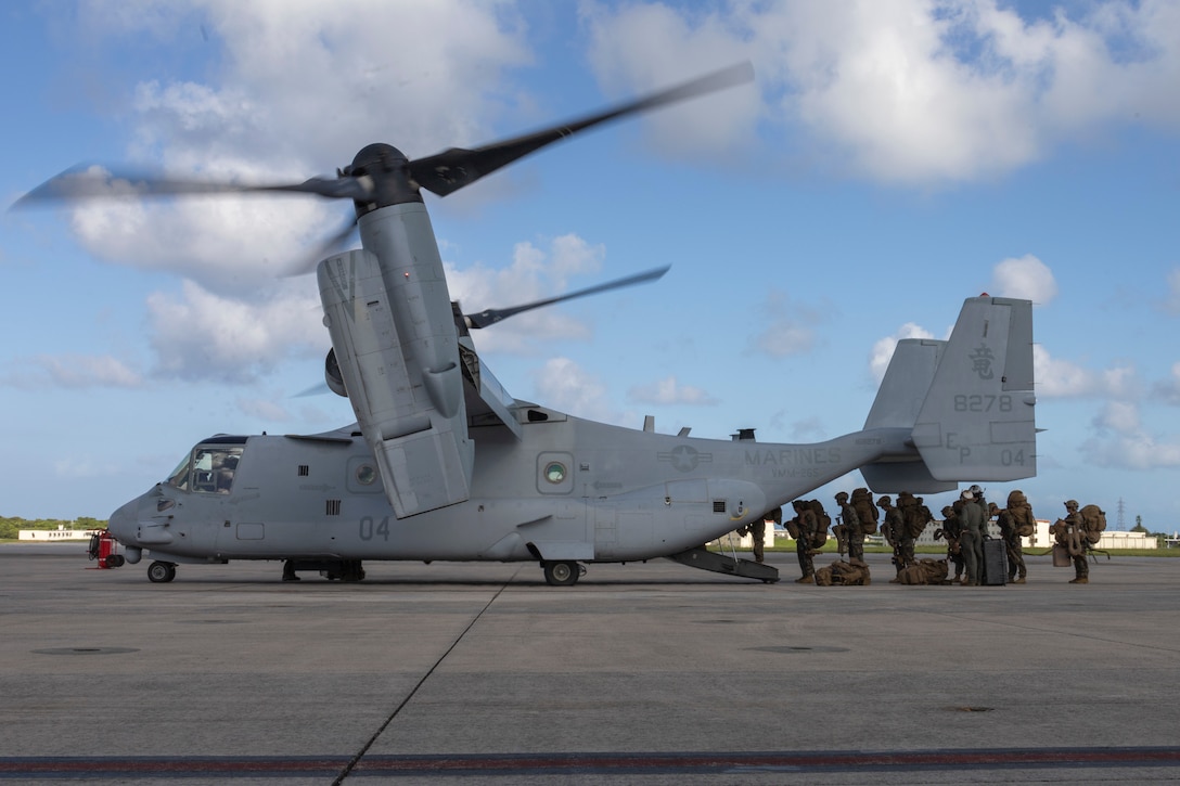 U.S. Marines with Battalion Landing Team 1st Battalion, 7th Marine Regiment, 31st Marine Expeditionary Unit, load onto a U.S. Marine Corps MV-22B Osprey assigned to Marine Medium Tiltrotor Squadron (VMM) 265 (Rein.), at Marine Corps Air Station Futenma, Okinawa, Japan, Sept. 26, 2025. The Marines conducted flight operations demonstrating multi-domain transport capabilities of the 31st MEU. The 31st MEU, the Marine Corps’ only continuously forward-deployed MEU, provides a flexible and lethal force, ready to perform a wide range of military operations as the premiere crisis response force in the Indo-Pacific region. (U.S. Marine Corps photo by Lance Cpl. Skilah Sanchez)
