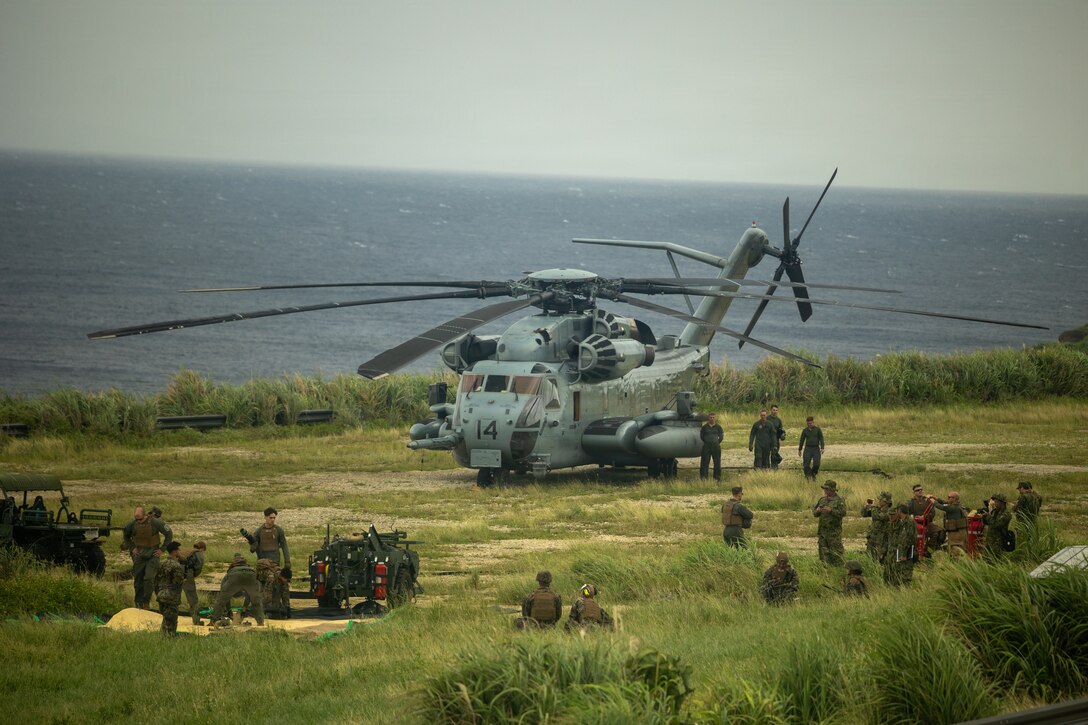 U.S. Marines with Marine Aircraft Group 36, 1st Marine Aircraft Wing and Japan Ground Self-Defense Force members establish a forward arming refueling point on Yonaguni, Japan, Oct. 27, 2025. The FARP training enhanced interoperability and strengthened the ability of U.S. Marines and the JGSDF to control and defend key maritime terrain. (U.S. Marine Corps photo by Lance Cpl. Ryan Sotodavila)