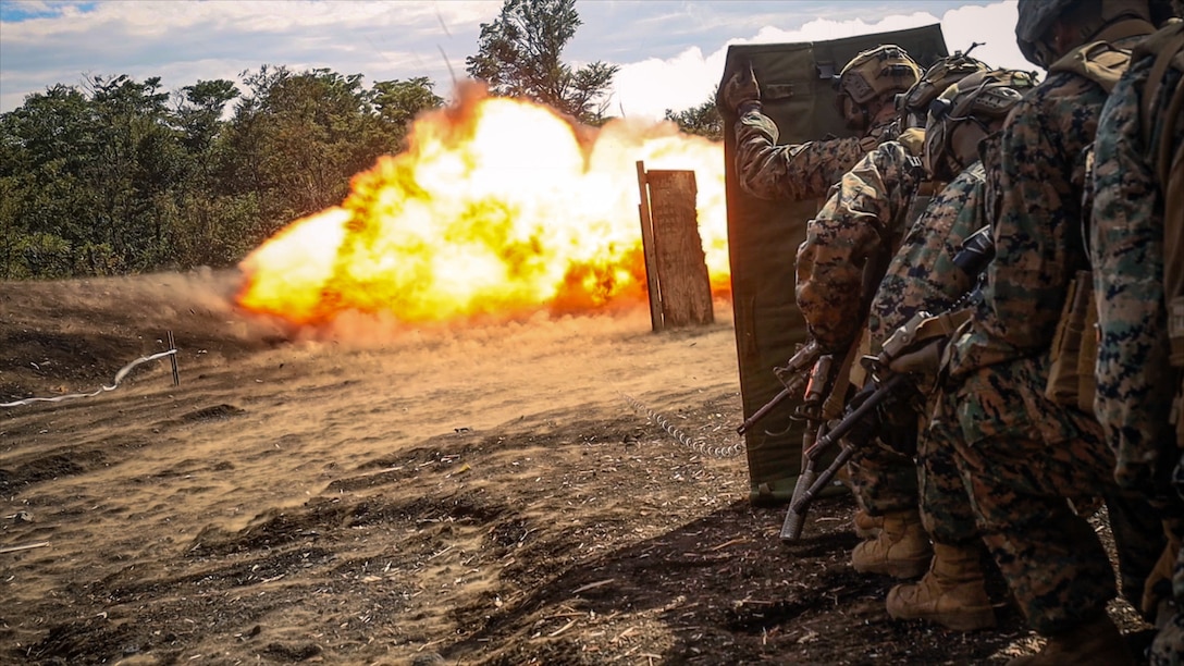 U.S. Marines with Battalion Landing Team 1st Battalion, 7th Marine Regiment, 31st Marine Expeditionary Unit, detonate a detonating cord charge during live-fire training at Combined Arms Training Center, Camp Fuji, Japan, Sept. 29, 2025. Marines conducted combined arms live-fire training to maintain operational readiness, tactical proficiency, and enhance lethality while operating within the first island chain. The 31st MEU, the Marine Corps’ only continuously forward-deployed MEU, provides a flexible and lethal force ready to perform a wide range of military operations as the premiere crisis response force in the Indo-Pacific region. (U.S. Marine Corps photo by Lance Cpl. Victor Gurrola)