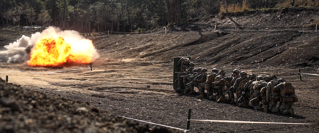 U.S. Marines with Battalion Landing Team 1st Battalion, 7th Marine Regiment, 31st Marine Expeditionary Unit, detonate a C4 and detonating cord charge during live-fire training at Combined Arms Training Center, Camp Fuji, Japan, Sept. 29, 2025. Marines conducted combined arms live-fire training to maintain operational readiness, tactical proficiency, and enhance lethality while operating within the first island chain. The 31st MEU, the Marine Corps’ only continuously forward-deployed MEU, provides a flexible and lethal force ready to perform a wide range of military operations as the premiere crisis response force in the Indo-Pacific region. (U.S. Marine Corps photo by Lance Cpl. Victor Gurrola)